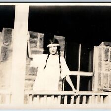 c1910s Cute Young Lady RPPC +Indian Headband Pigtail Girl House Porch Photo A213 picture