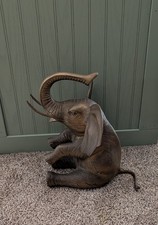 Vintage Heavy Brass Elephant Figurine with raised trunk. Mid to late 20th MC picture