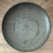 Vintage Chinese etched metal or brass decorative bowl featuring a dragon motif picture