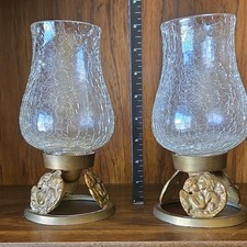 A pair of brass cherub and crackle glass hurricane candle holders by India House picture