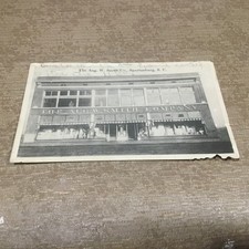 1915 Spartanburg SC  Postcard The ( Aug. W. Smith Co. ) Store Front picture