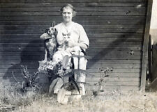 1914 Woman Sits Dog & CAt in Her Lap by House w Plants RPPC picture