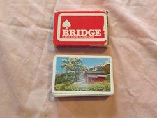 VINTAGE WOOLWORTH WOOLCO PLASTIC COATED BRIDGE PLAYING CARDS picture