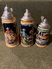 German Lidded Steins Lot Of 3; All 3 Made In Germany. Each Has It’s Own Artwork picture