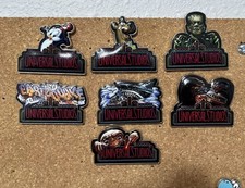 Universal Studios 7 Piece Pin lot - LIMITED RELEASE MYSTERY RIDE SET NO BACKS picture
