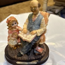 Grandfather Reading To Granddaughter Figurine-Monterfiori Collection picture