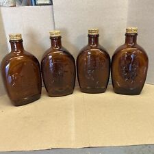 Lot of  ( 4 ) Vintage Log Cabin Syrup Bicentennial Glass Bottles Amber 1776 picture