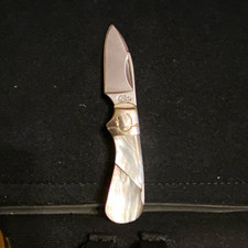 COLT ct566 black genuine Mother of Pearl. Discontinued. Exquisite scales picture