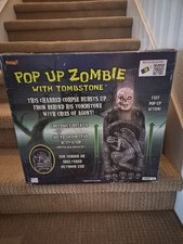 SPIRIT HALLOWEEN POP UP ZOMBIE NEW IN BOX RARE 2014 ANIMATED. picture