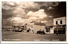Real Photo Postcard Automobiles Along Main Street in Three Forks, Montana picture