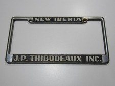 VTG J.P. Thibodeaux Cadillac-Olds New Iberia LA Metal License Plate Frame Tag picture