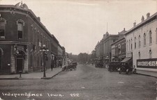 Independence Iowa Main Street View Automobiles RPPC 1923 Bank & Grocery Store picture