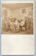 RPPC Photo Postcard Hunting Cabin Lodge Interior Camp Dupont c1910's Antique picture