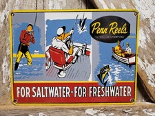 VINTAGE PENN REELS PORCELAIN SIGN OLD FISHING RODS TACKLE LURES BAIT SALTWATER picture
