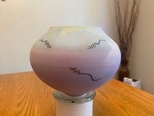 Intricate Native American Pottery Vase in pastel colors, signed by artist picture