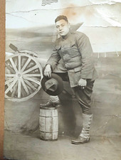 WWI Era RPPC Soldier in Uniform by Cannon,Flag Has Creases Divided Back.. P37 picture