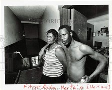 1981 Press Photo Haitians Fito and Anita Martain pose at their home in Dade, FL picture