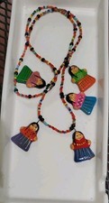 Artisan crafted vintage seed beadednecklace mexican dolls picture