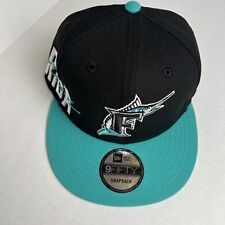 MLB Florida Marlins 9FIFTY Adjustable Snap Back New Era Cap Black Side Spell out picture