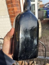 unusual shaped 18th century black glass hand blown antique bottle picture