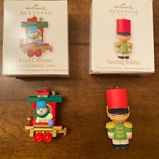 Hallmark Ornaments Smiling Soldier Cool Caboose 2010 2011 Lot of 2 R7 picture