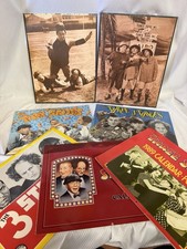 The Three Stooges Lot Of (5) Calendars And (2) Hardbacked Prints picture