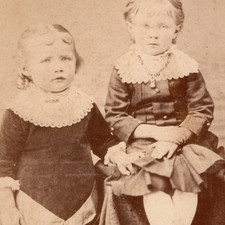 c1880s Cabinet Card Photo Two Children Lace Collars Pleated Skirts Button Boots picture