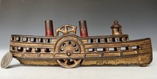 Antique AC Williams Gold-Painted Cast Iron Still Penny “Steamboat” Bank (M#1459) picture