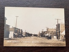 RPPC Oregon Street Scene Columbia Hotel Coos Merc. Co. early 1900s picture