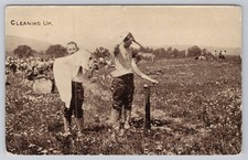 Postcard Cleaning Up men washing in a rural field setting Divided Back c1910 picture