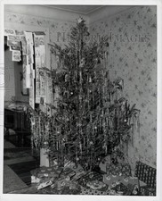Press Photo Gifts Under Christmas Tree in Private Home - kfx16996 picture