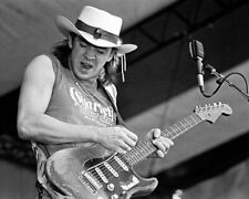 Stevie Ray Vaughan in full swing playing his guitar 8x10 inch photo picture