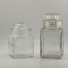 Two Vintage-Style Clear Glass Square Spice Jars With Glass Lids picture