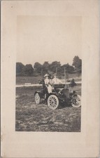 RPPC Postcard Couple Cruising in Antique Car Early 1900s  picture