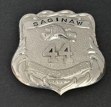 Antique Obsolete Saginaw, Michigan Fire Department Badge #44 picture