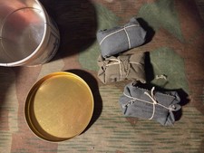 WW2 German reproduction or original first aid / 3 wound bandages, new in a tin picture
