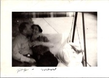 Affectionate Couple Kissing on Porch Swing, 1940s B&W Snapshot Photo picture