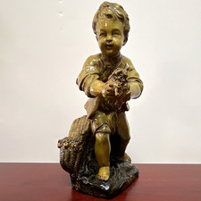 vintage chalkware figurine of a young boy holding flowers, Borhhese picture