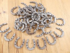 50 SMALL CAST IRON HORSESHOES **HAVE RUST** CRAFTS BARGIN BIN DECOR HORSE SHOE picture
