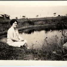 c1920s Woman Sitting Farm Pond Snapshot Photo Barn Horse Statue Rural Nostalgic picture