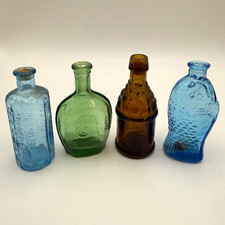 4 vintage mini glass bottles. Wheaton style 3” Taiwan Fish, drum, Ben Franklin picture