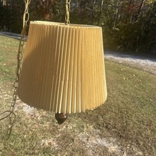 vintage yellow pleated plastic hanging swag pendant lamp with a chain suspension picture