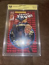 ZOMBIE TRUMP #1 YOU'RE FIRED EDITION Signed By Marat Mychaels. CBCS 9.8 not CGC picture