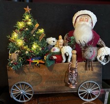 Handmade Santa In Cheese Box Wagon picture