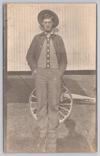 Vintage Real Photo Postcard RPPC of Handsome Young Man with Wagon Wheel picture