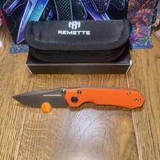 REMETTE RT-Rhino Orange RNGD3 G10 Scales. D2 Blade. Button/liner Lock Thumb Stud picture