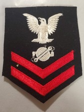 WWll Era U.S. Navy Rating Badge for a Machinist's Mate Second Class (MM2) picture