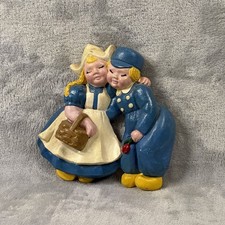 vintage hand-painted chalkware  featuring a Dutch boy and girl picture