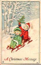 c1910's Christmas Message Children Sledding Winter Berries Antique Postcard picture