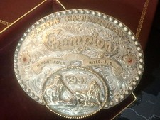 VNTG 1991 RUBEN'S TEAM ROPING CHAMPION TROPHY BUCKLE WESTERN EATON ENTERPRISE picture